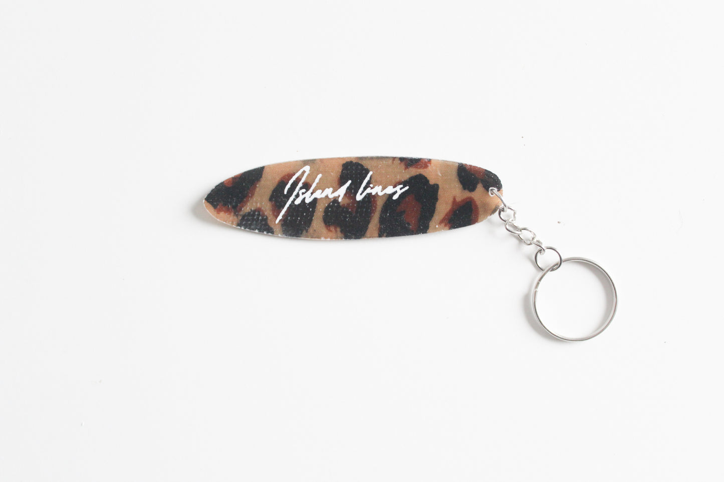 Surf shaped leopard key chain
