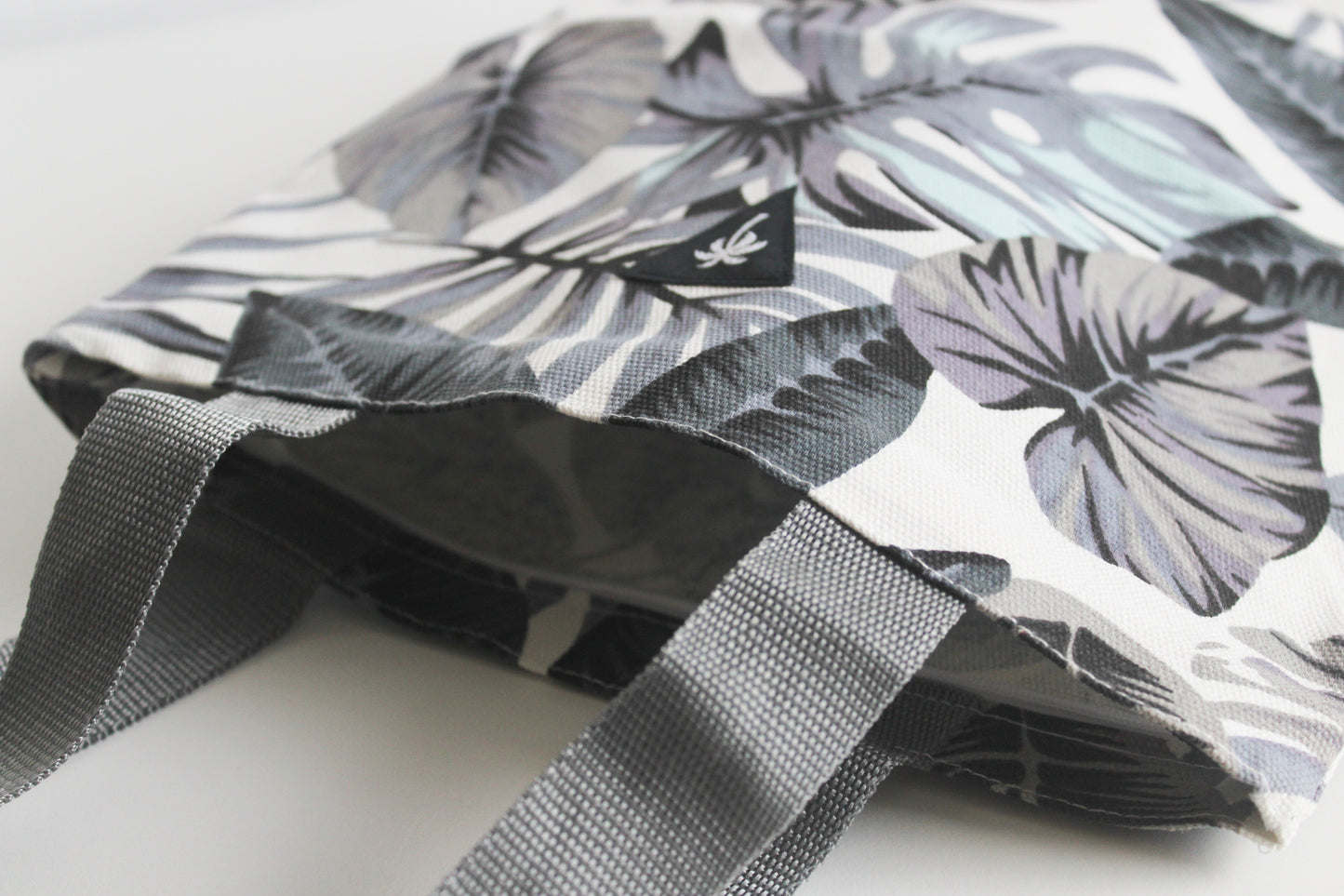 Blue monstera tote bag