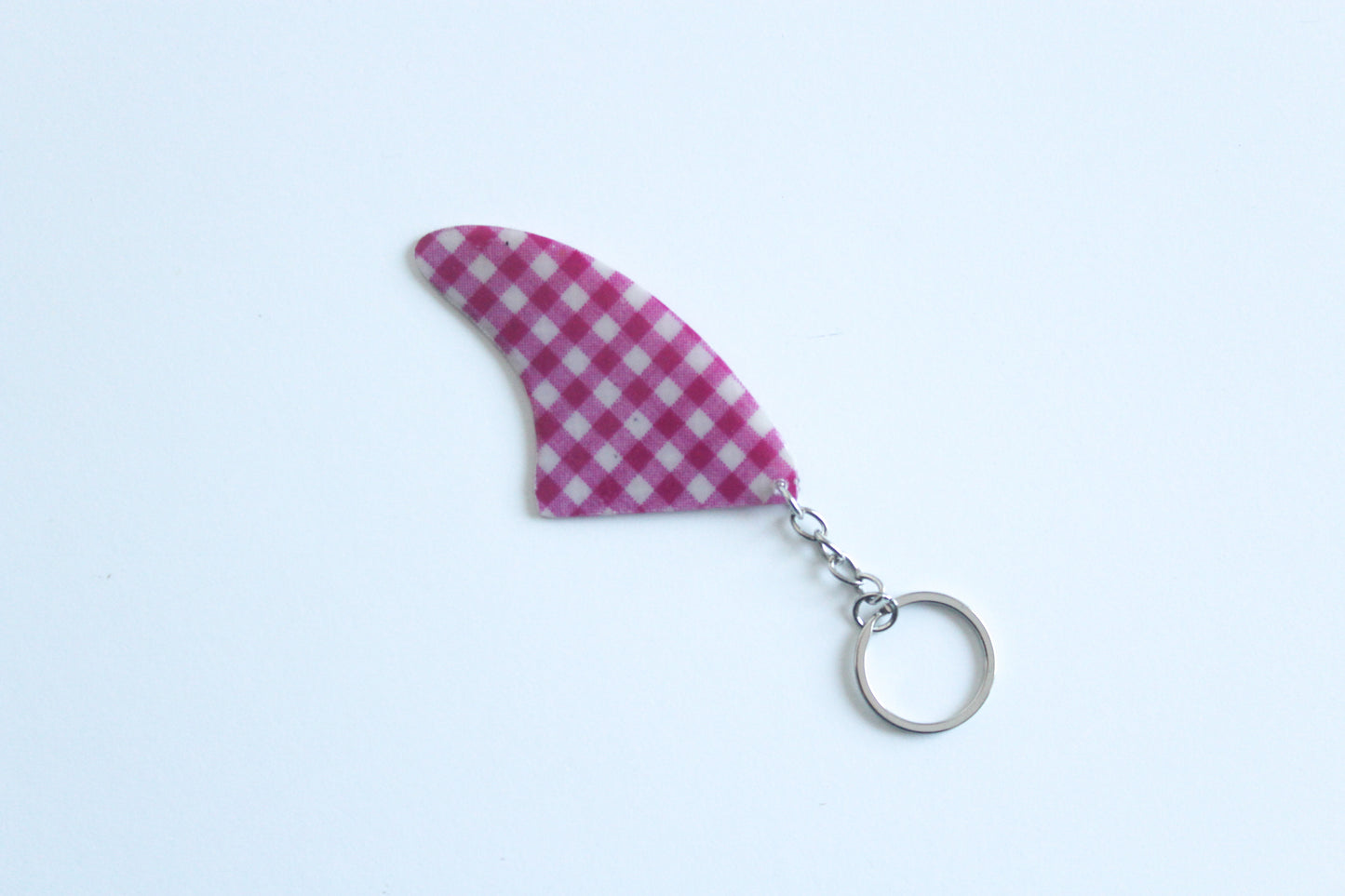 Fin shaped pinky key chain