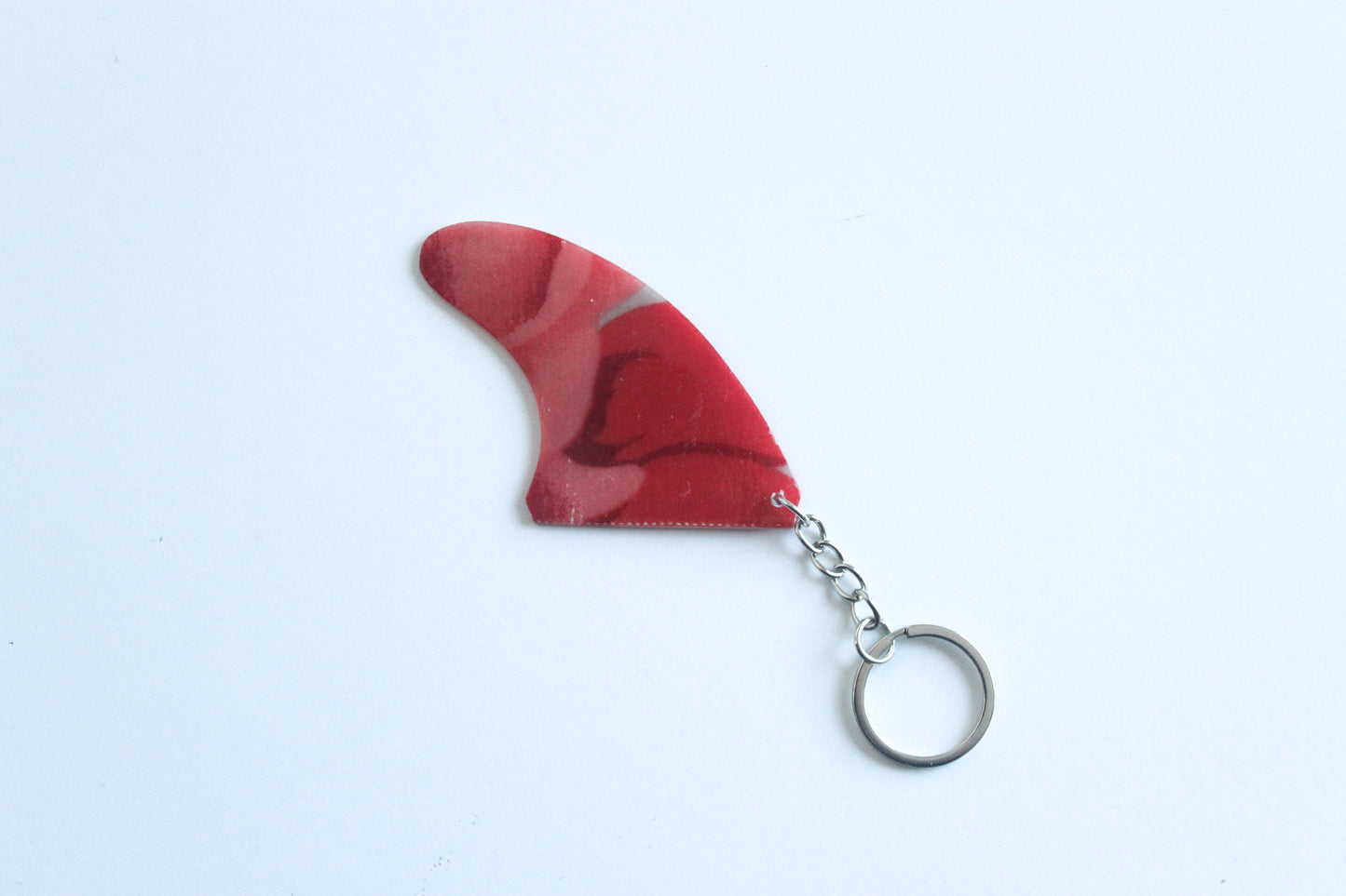 Fin shaped abstract key chain