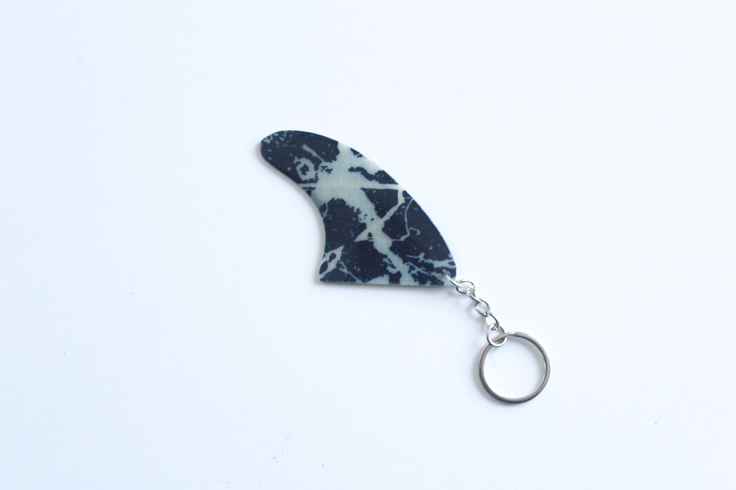 Fin shaped marble key chain