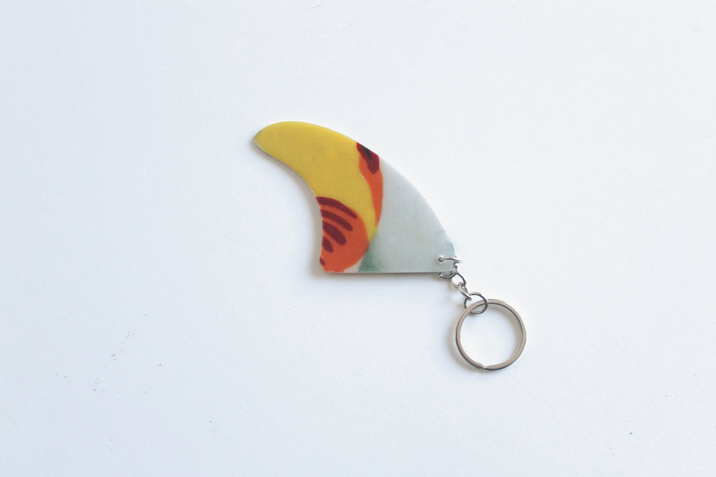 Fin shaped tropics key chain