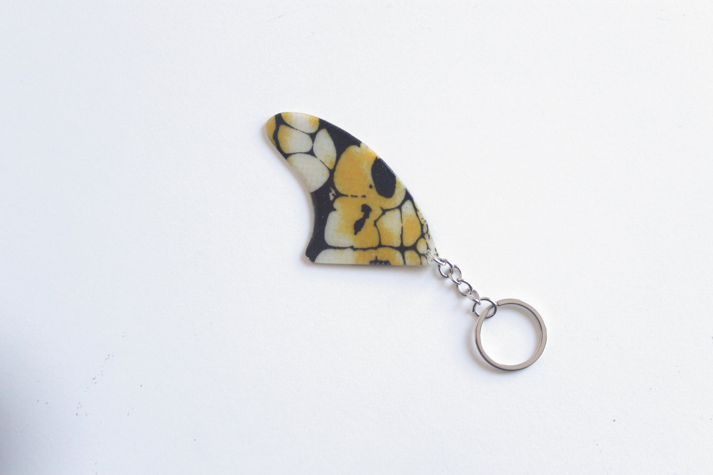 Fin shaped poison key chain