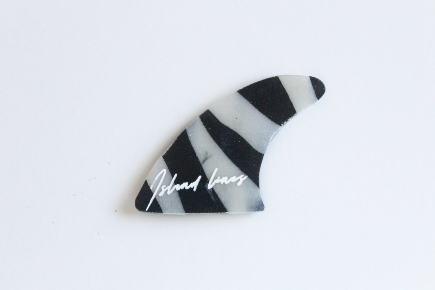 Fin shaped zebra magnet