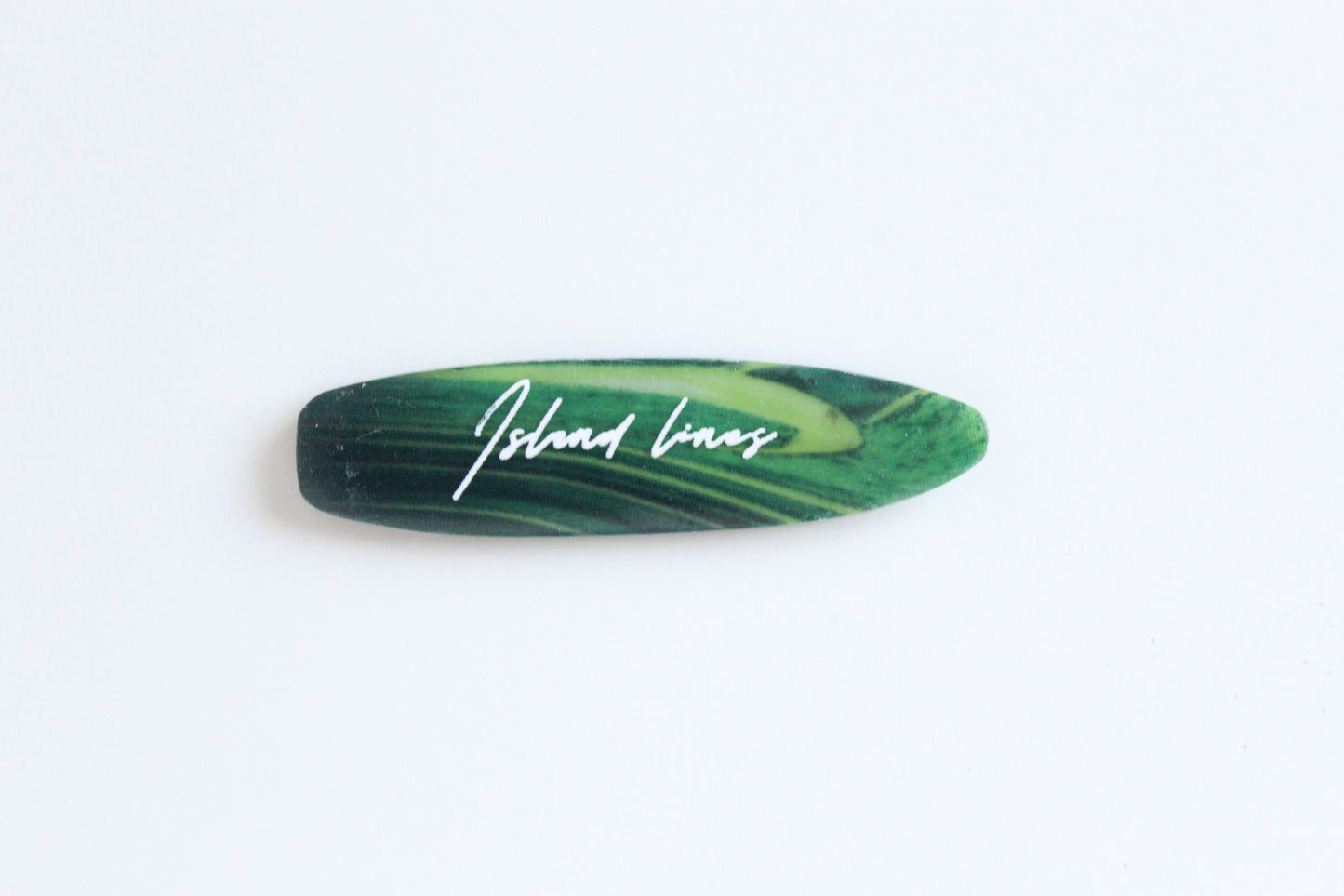 Surf shaped green magnet
