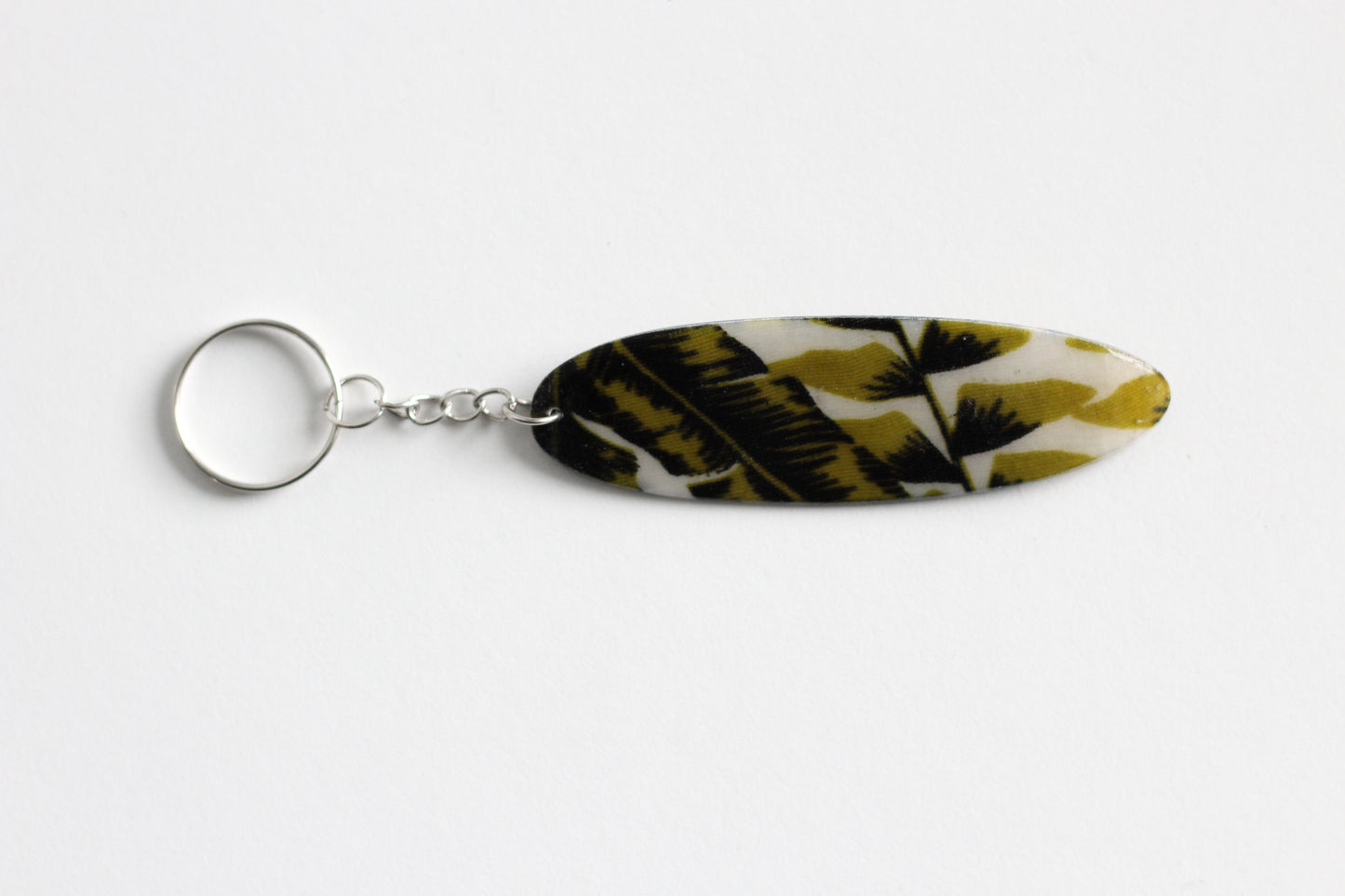 Surf shaped green key chain
