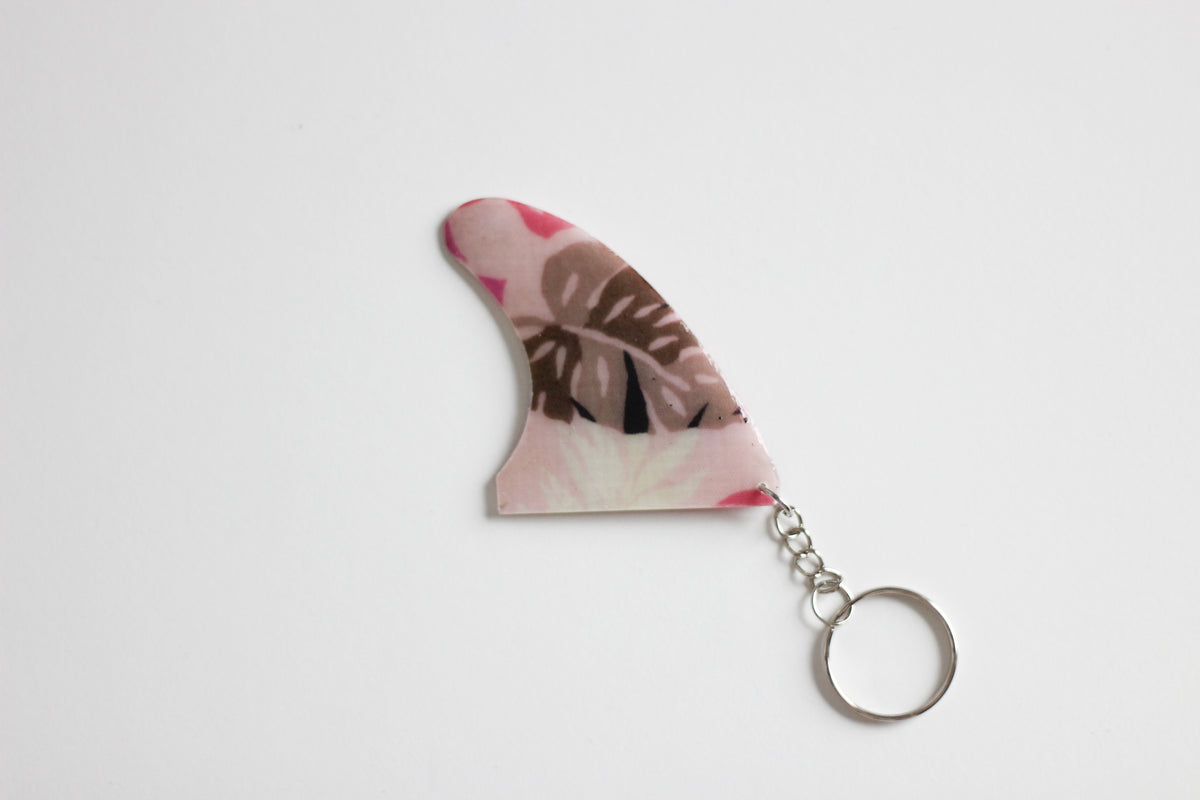 Fin shaped pink monstera key chain