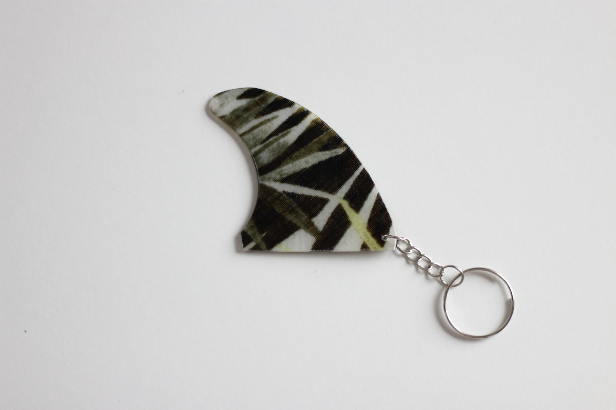 Fin shaped jungle key chain
