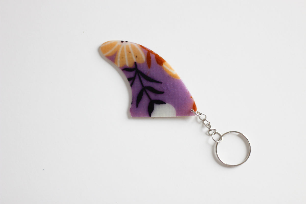 Fin shaped purple key chain