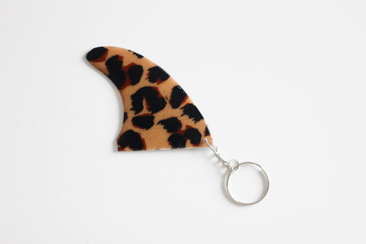 Fin shaped leopard key chain