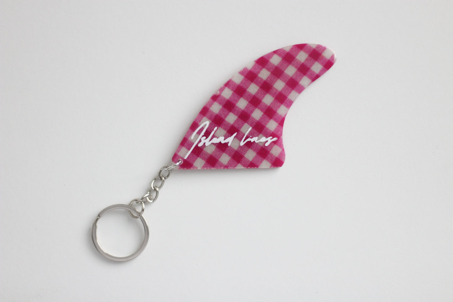 Fin shaped pinky key chain