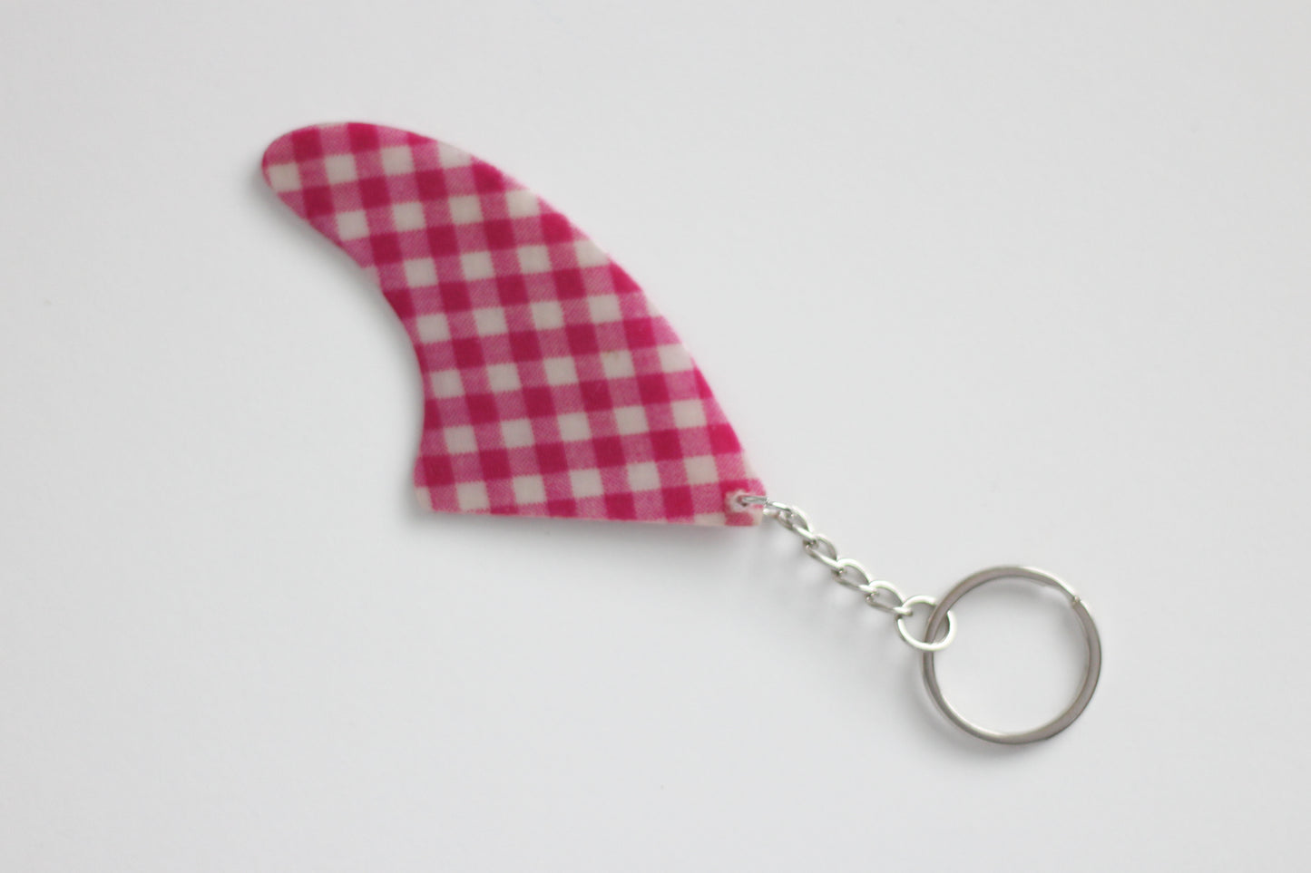 Fin shaped pinky key chain