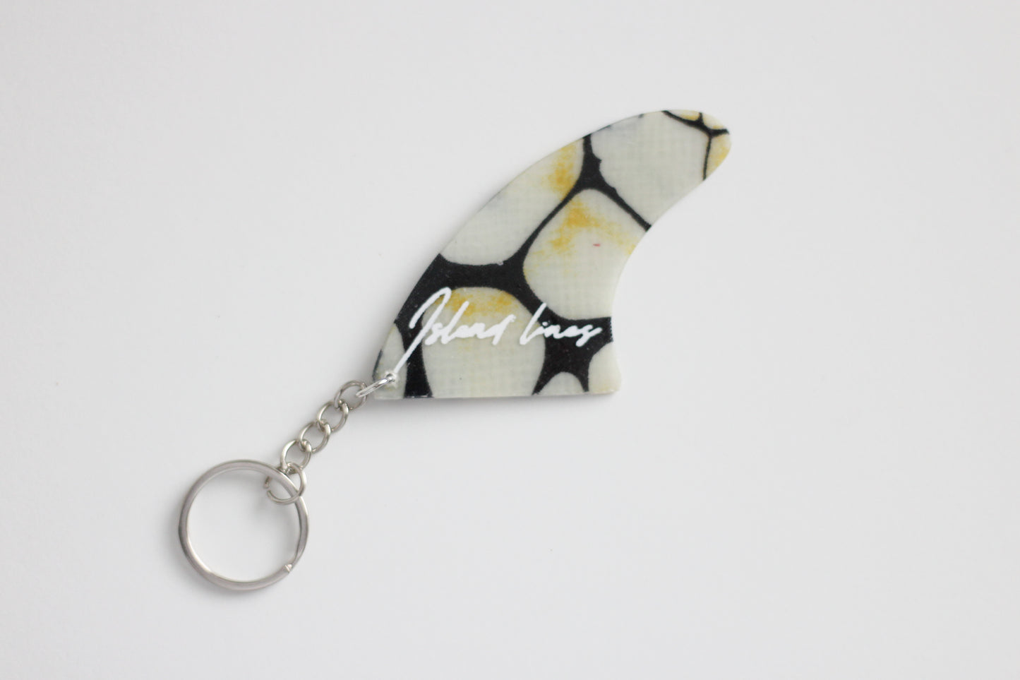 Fin shaped poison key chain