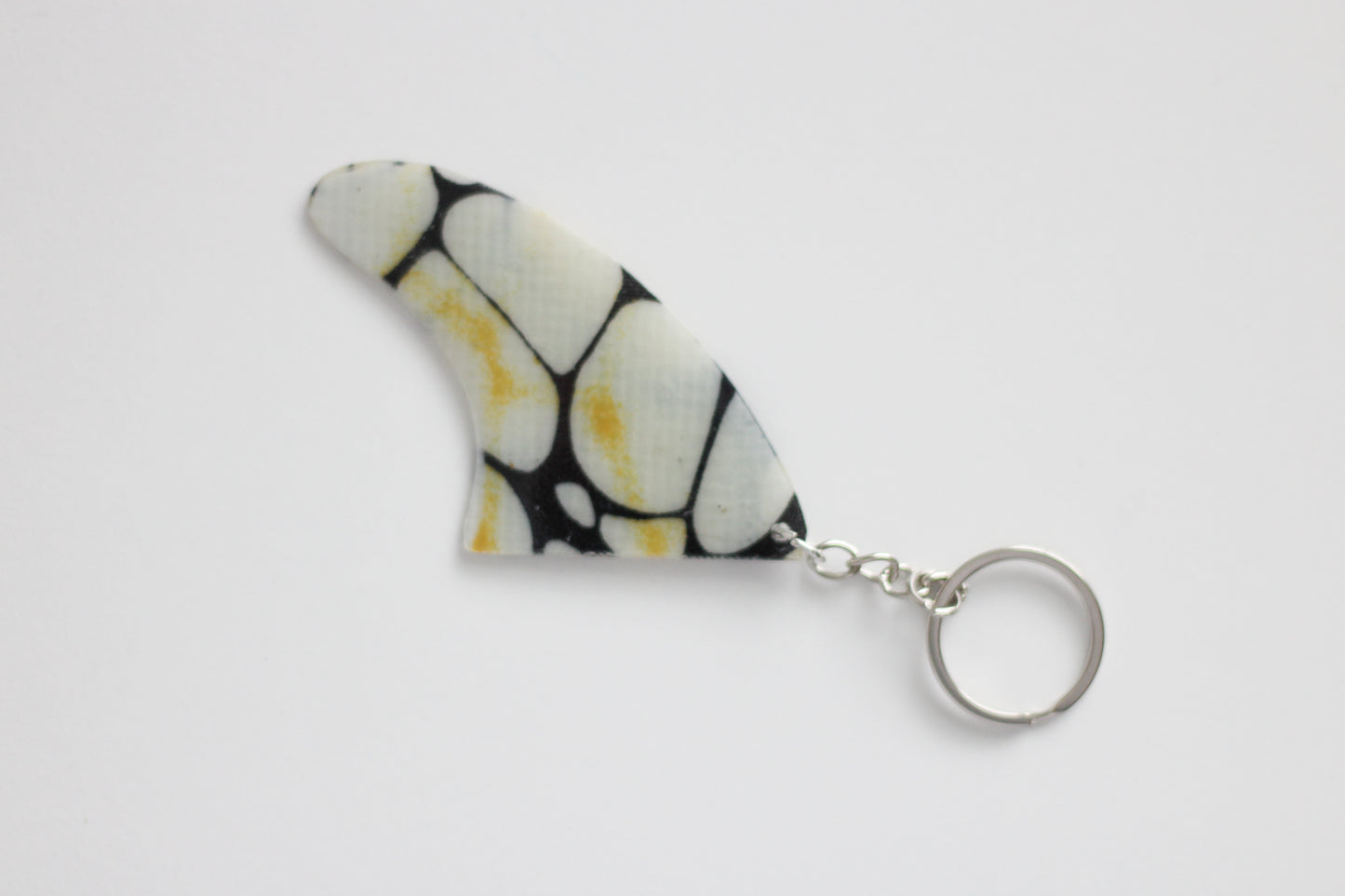 Fin shaped poison key chain