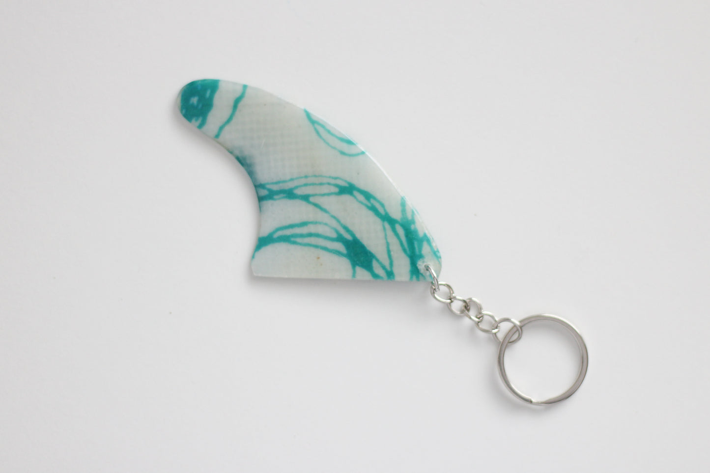 Fin shaped circles key chain