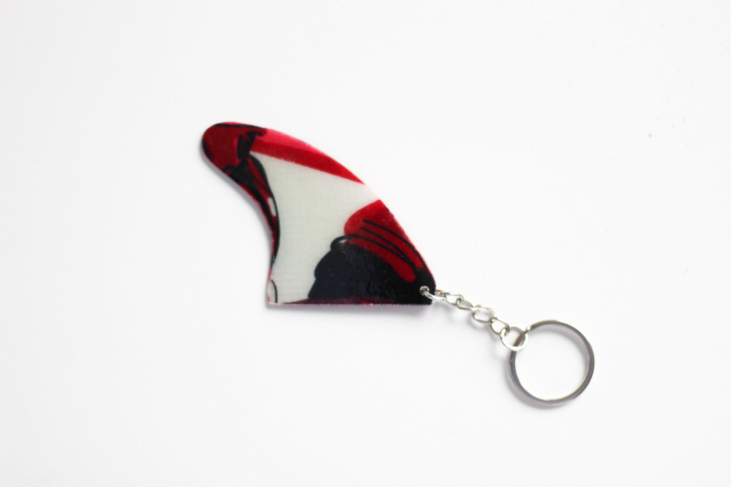 Fin shaped pinky key chain