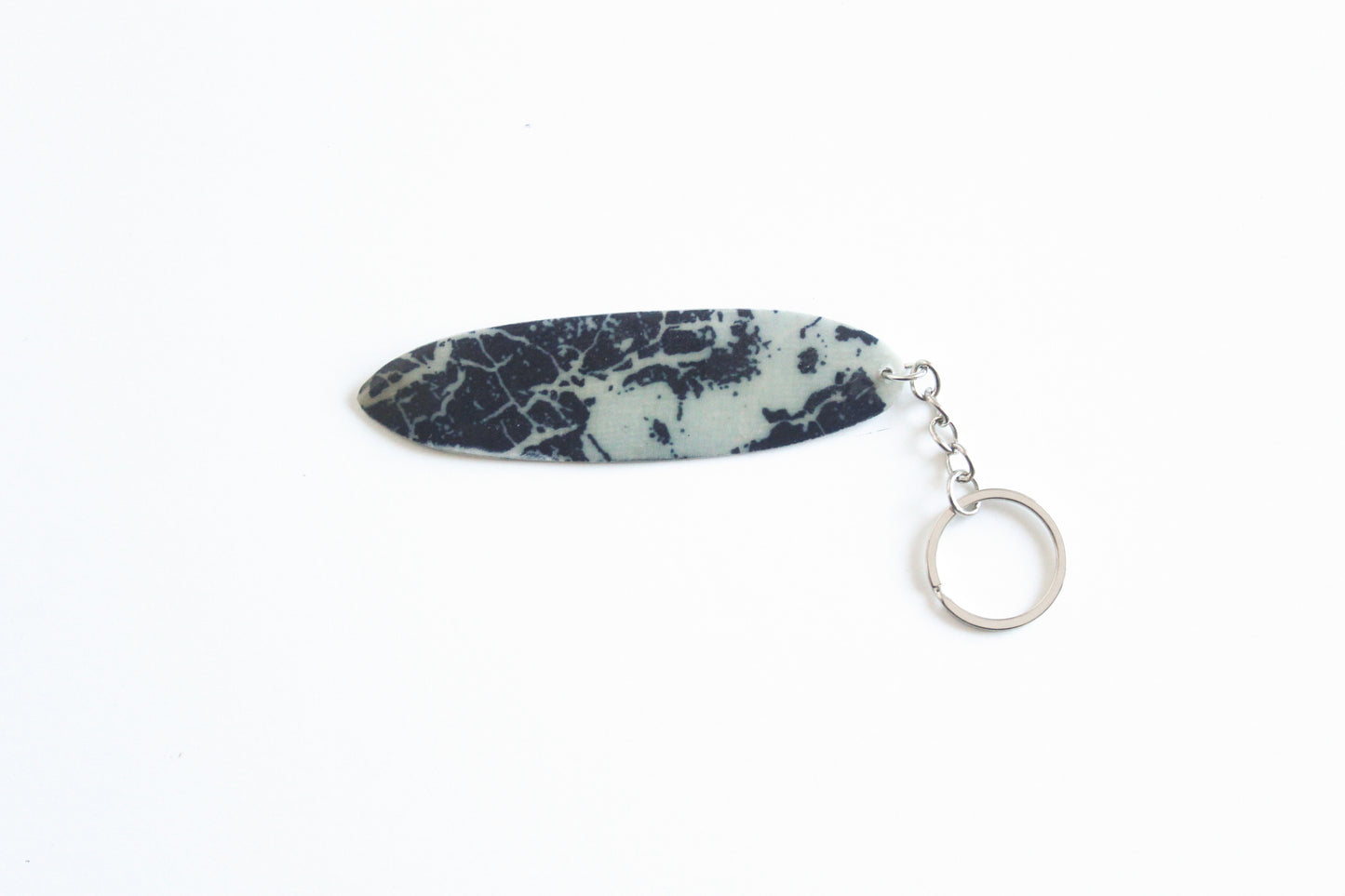 Surf shaped marble key chain