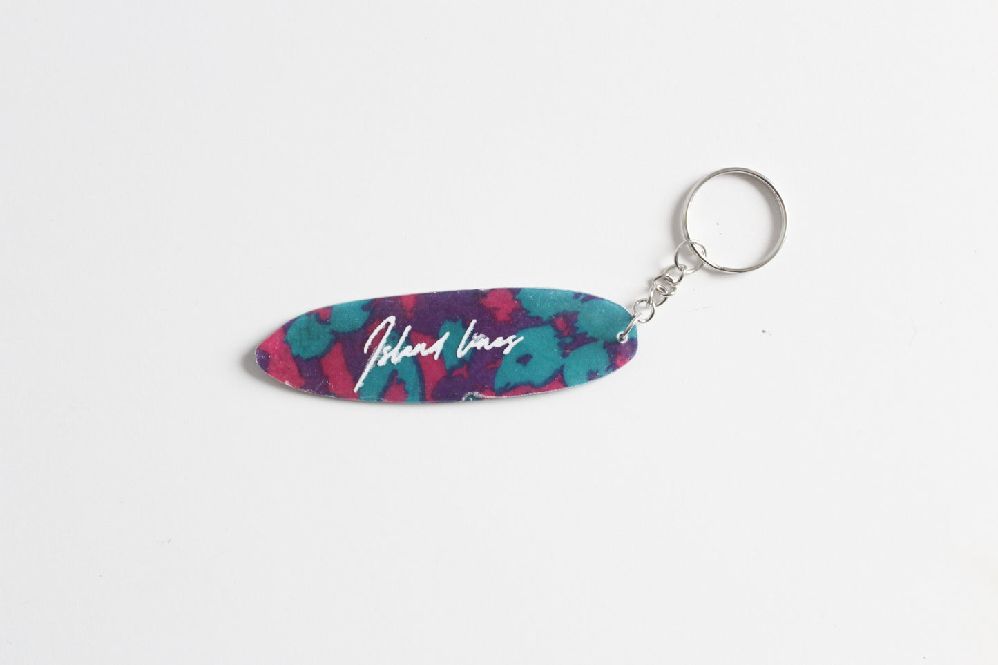 Surf shaped purple leopard key chain