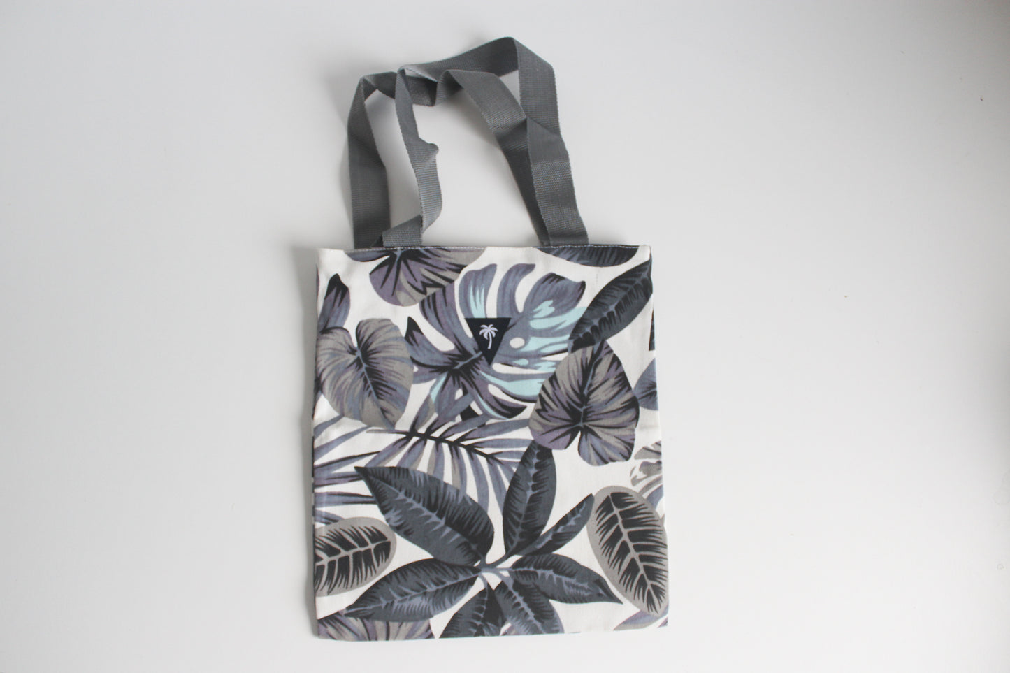 Blue monstera tote bag