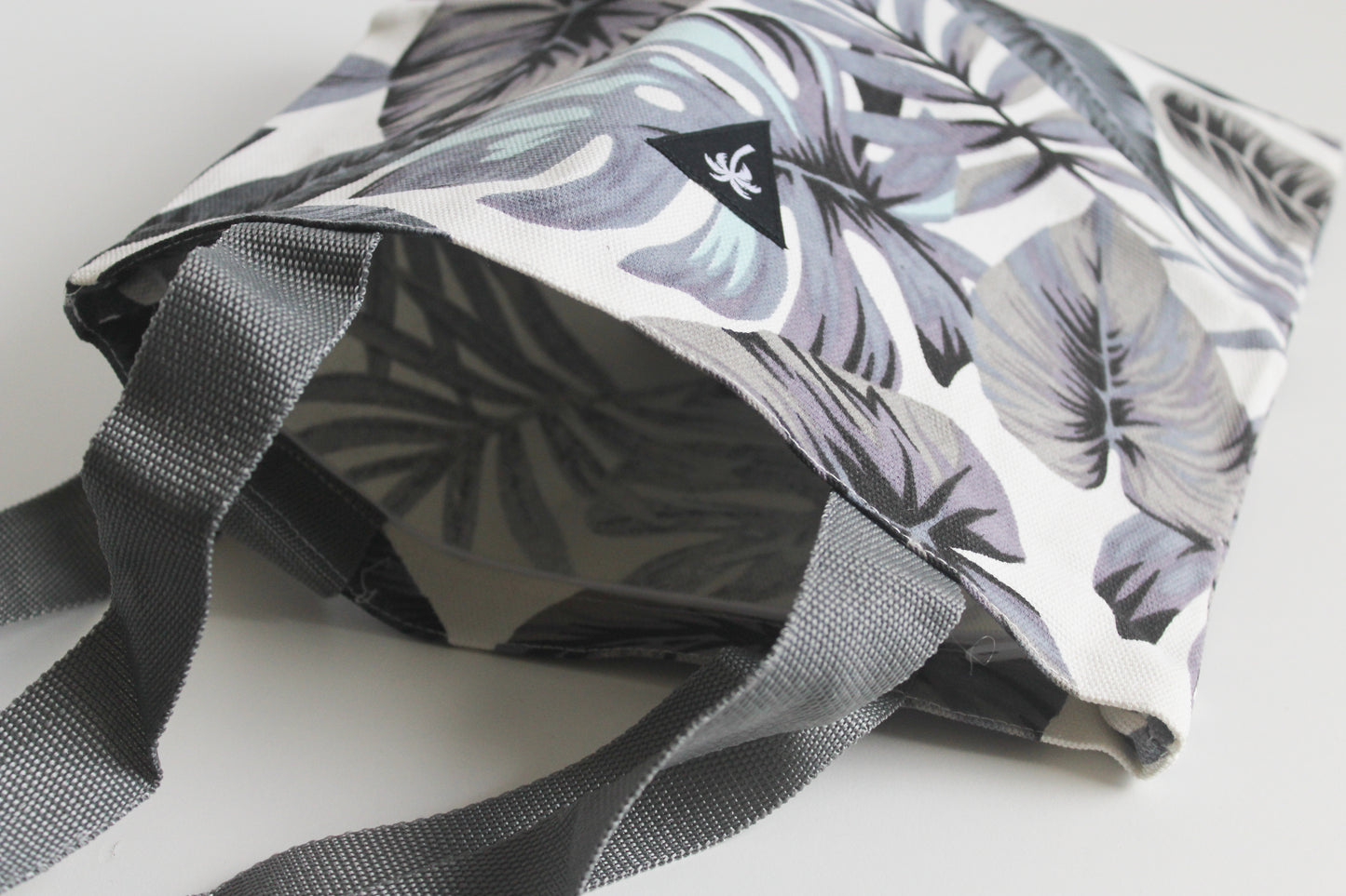 Blue monstera tote bag