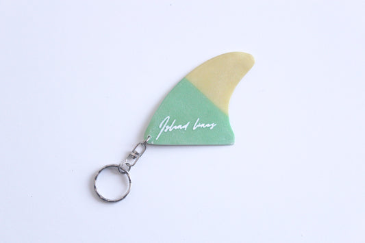 Fin shaped yellow-green key chain