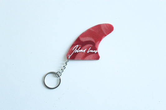 Fin shaped abstract key chain