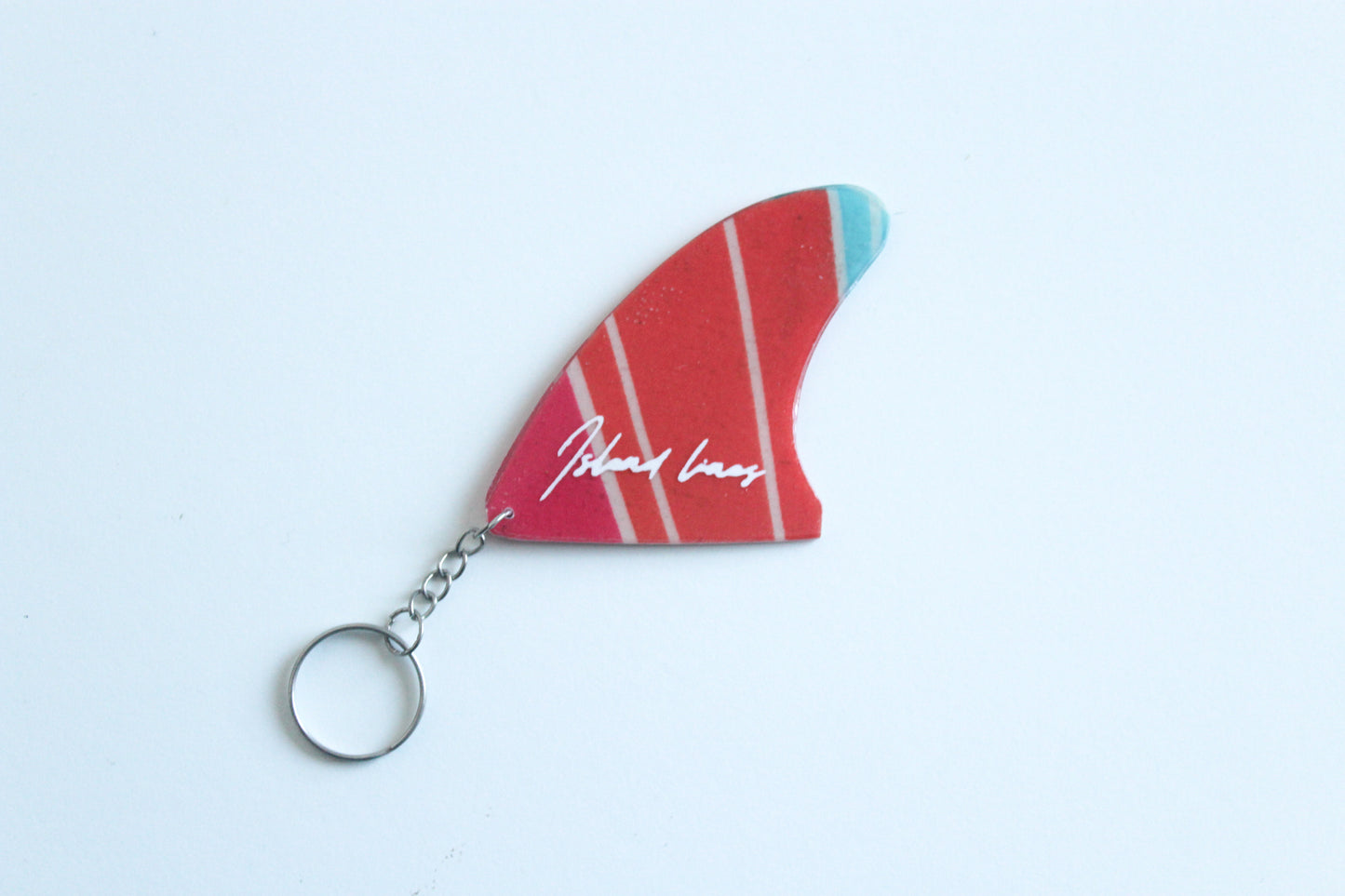 Fin shaped stripes key chain