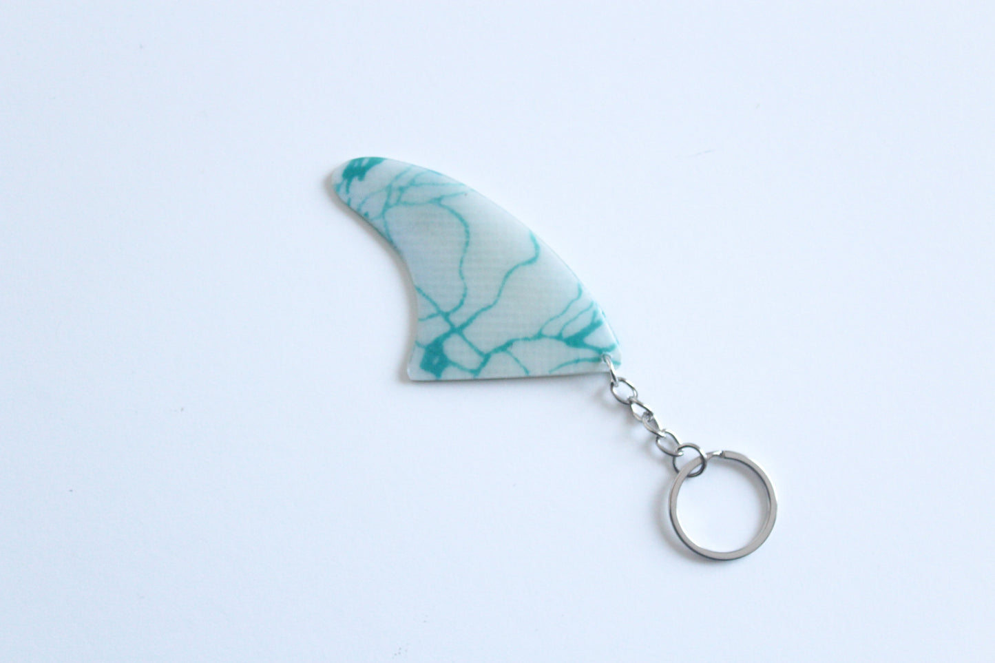 Fin shaped circles key chain