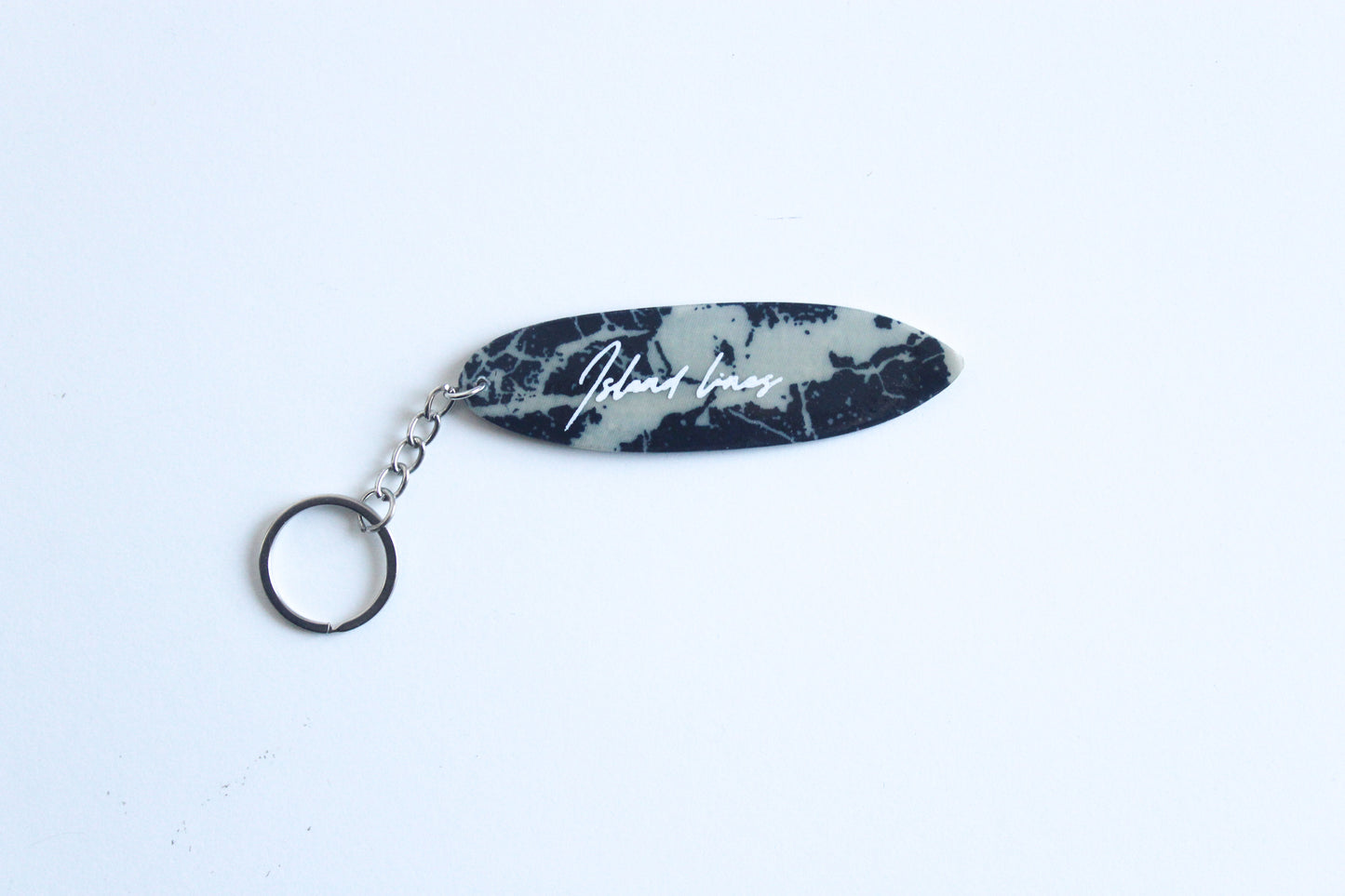 Surf shaped marble key chain