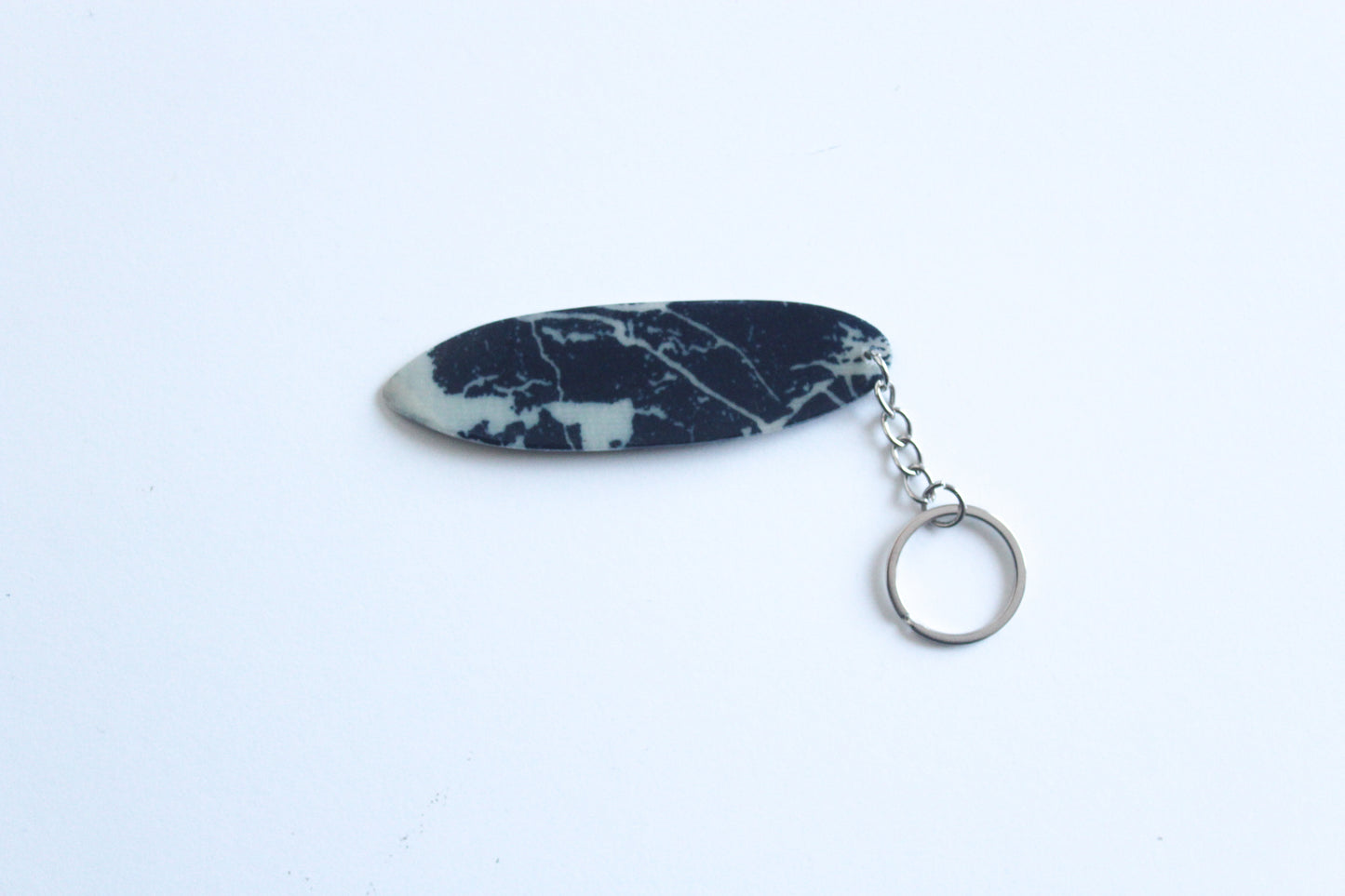 Surf shaped marble key chain