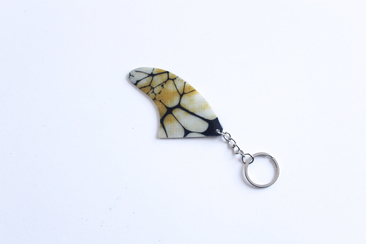 Fin shaped poison key chain