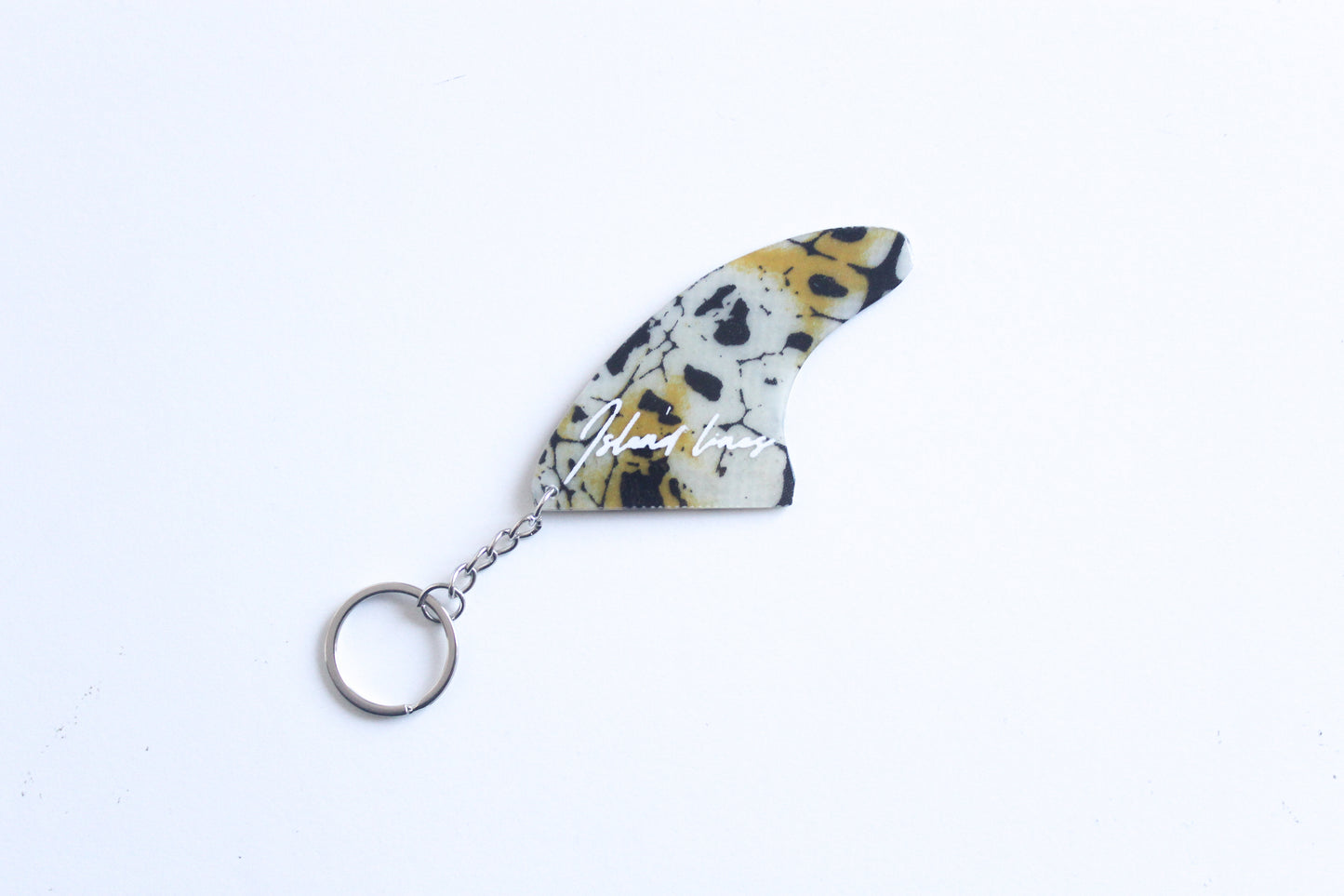 Fin shaped poison key chain
