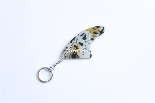 Fin shaped poison key chain