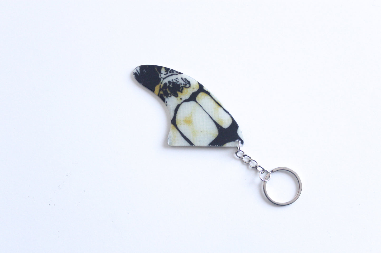 Fin shaped poison key chain