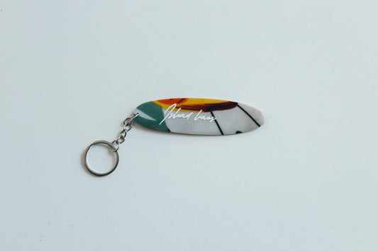 Surf shaped tropics key chain