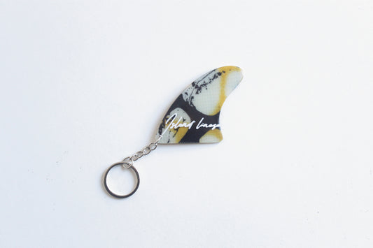 Fin shaped poison key chain