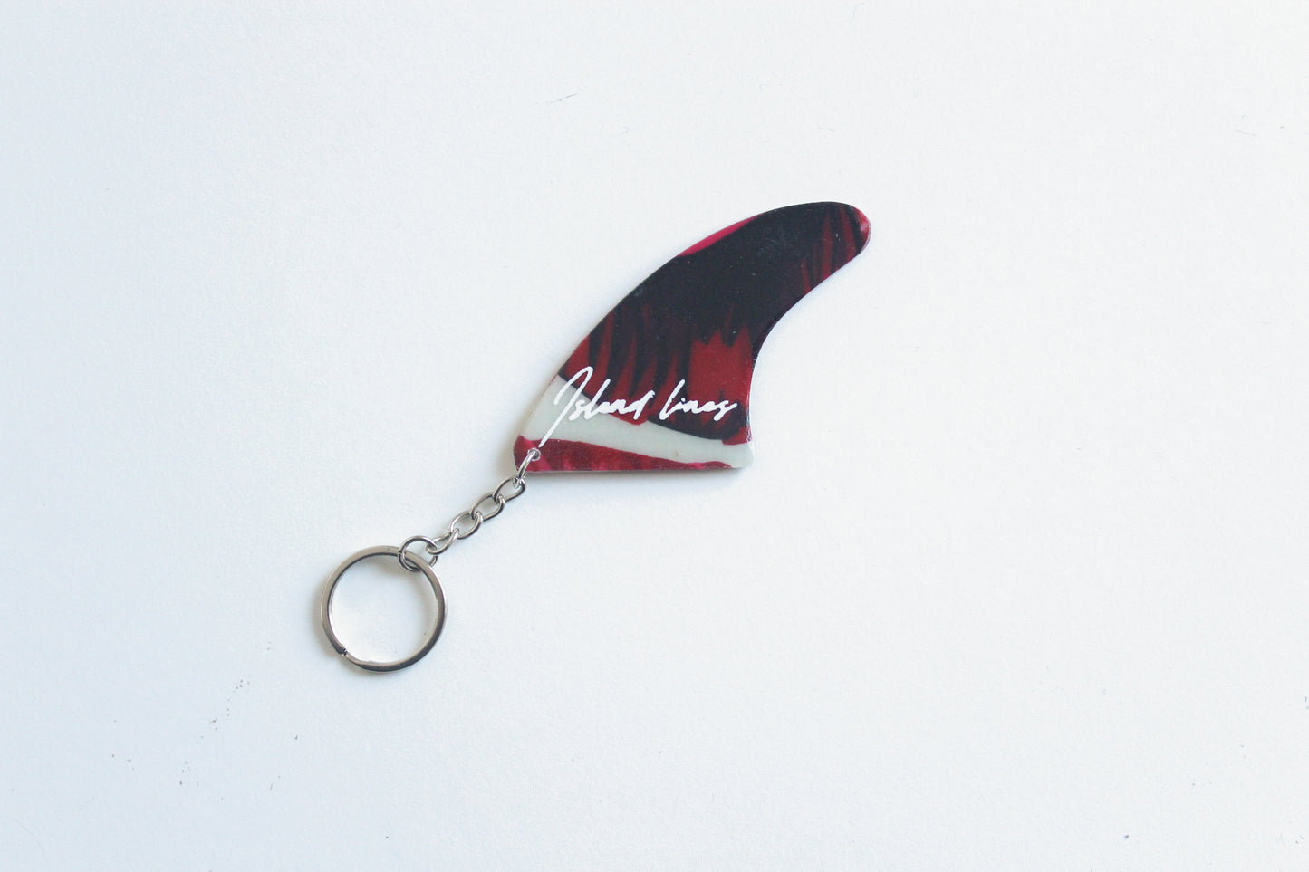 Fin shaped dark pink key chain