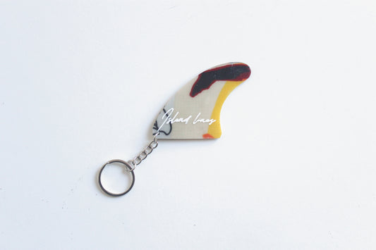 Fin shaped Picasso key chain