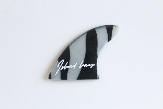 Fin shaped zebra magnet