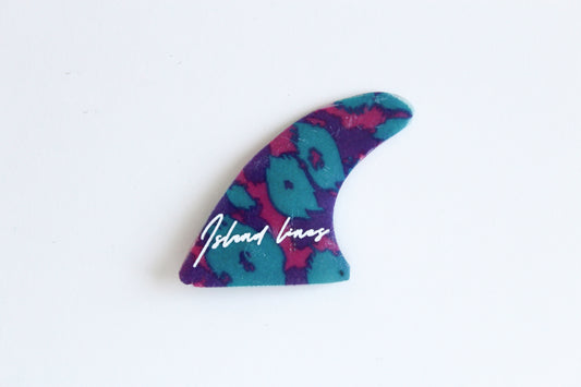 Fin shaped purple leopard magnet
