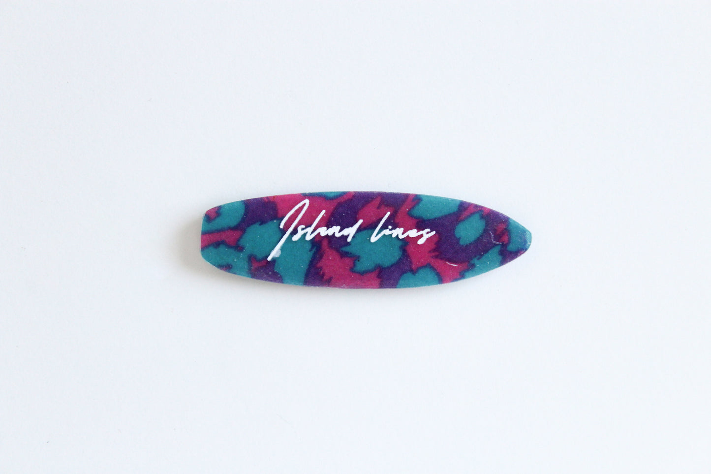 Surf shaped purple leopard magnet