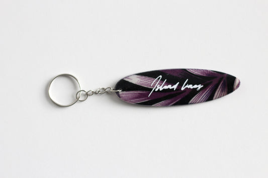 Surf shaped dark purple key chain