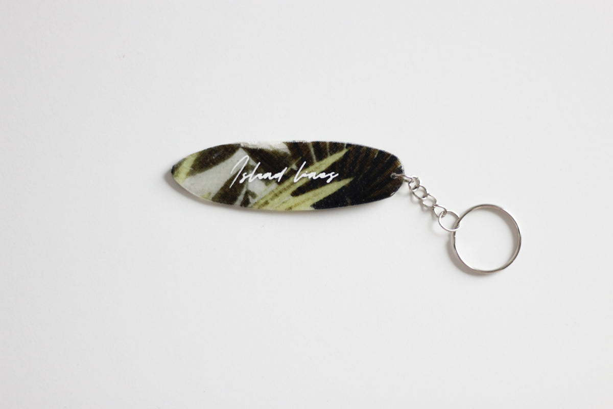 Surf shaped jungle key chain