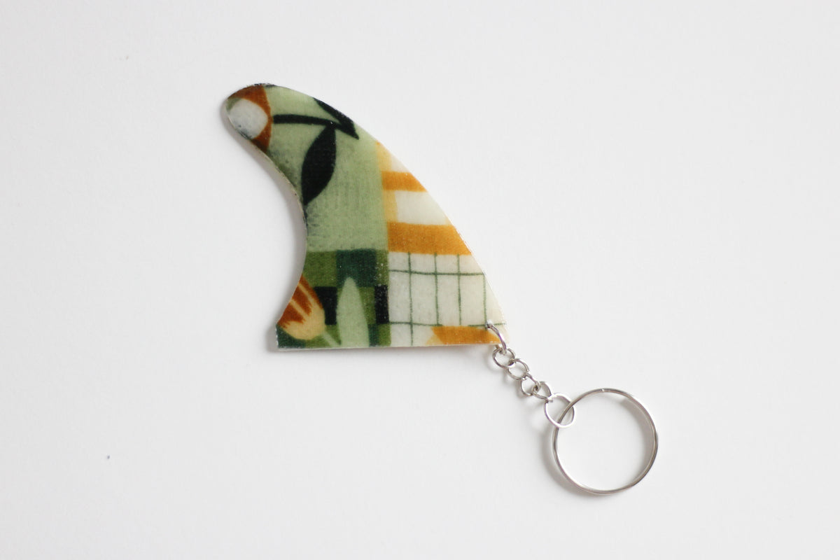 Fin shaped hippy key chain