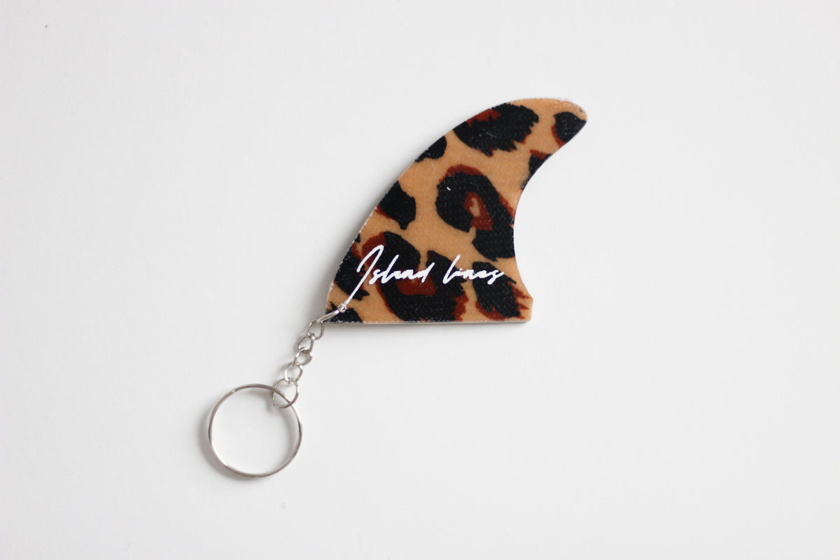 Fin shaped leopard key chain