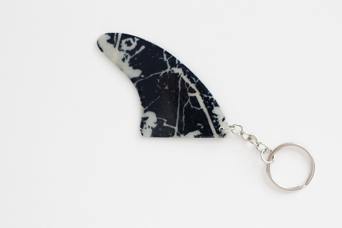 Fin shaped blue marble key chain