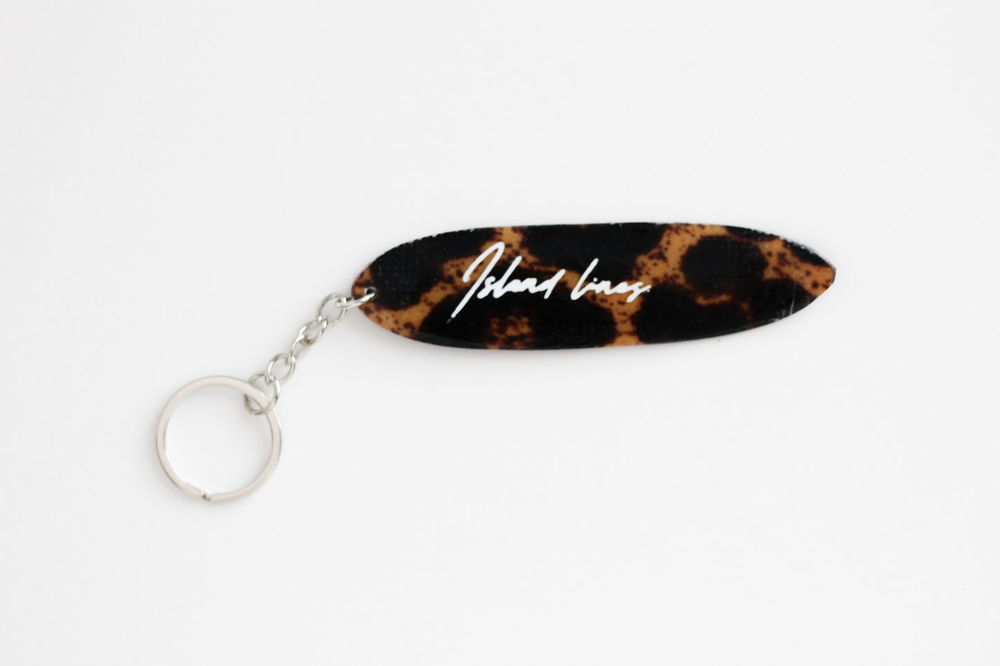 Surf shaped leopard key chain