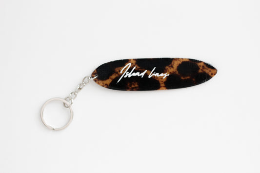 Surf shaped leopard key chain