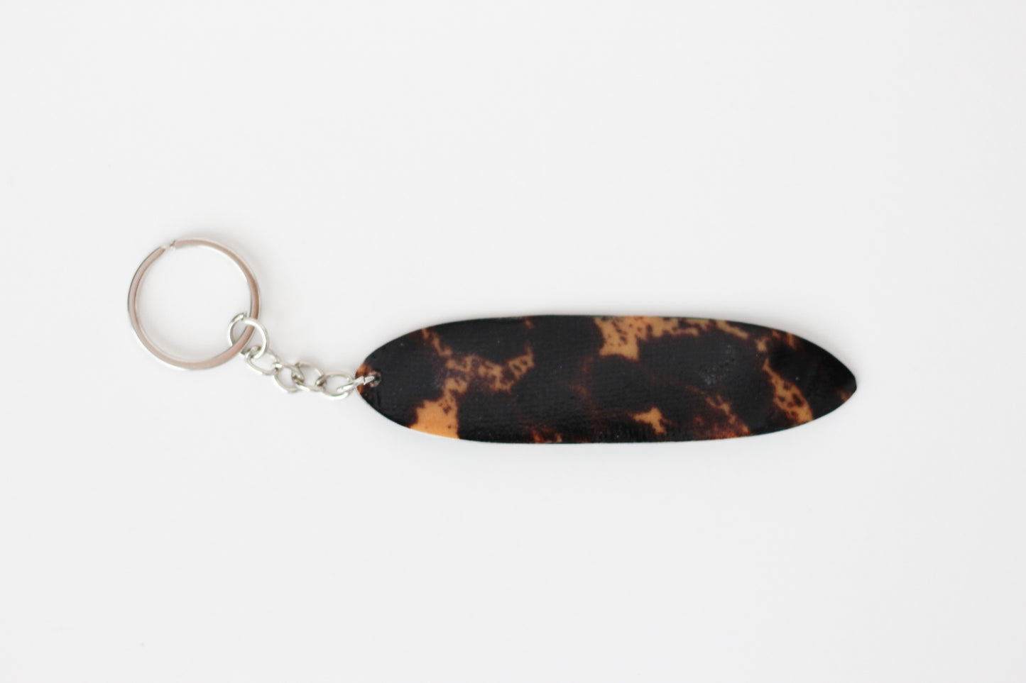 Surf shaped leopard key chain