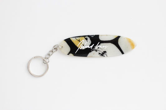 Surf shaped poison key chain